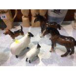 Pair of Beswick ponies, two sheep and a hound