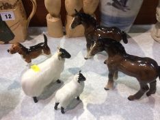 Pair of Beswick ponies, two sheep and a hound