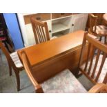 Teak table and four chairs