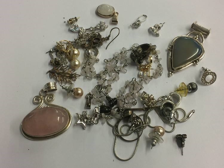 Quantity of pendants and earrings