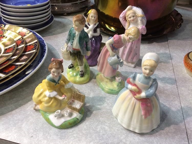 Six Royal Doulton figures