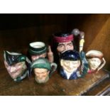 Six Royal Doulton Toby jugs