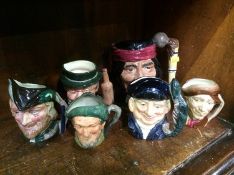 Six Royal Doulton Toby jugs