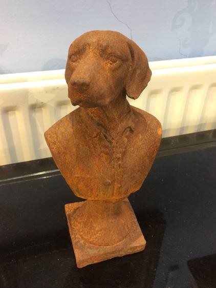 Cast metal bust of a dog