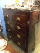 An Edwardian straight front chest of drawers