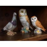 Two Beswick owls and a pigeon