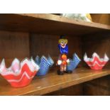 Four handkerchief vases and a Murano clown