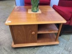 A square top bookcase coffee table with drawers