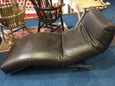 A modern Eilerson of Denmark brown leather day bed/couch