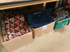 Three boxes of quilts and clippy mats