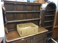 Ercol dresser and a narrow bookcase