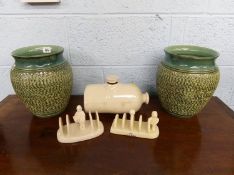 A pair of green Denby vases, two toast racks and a bed warmer