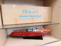 An Ariston model wood boat