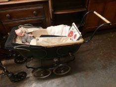 A child's pram and contents