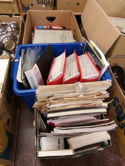 Three boxes of football programmes etc.