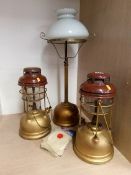 Three Tilley lamps