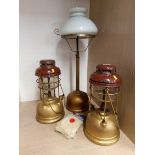 Three Tilley lamps