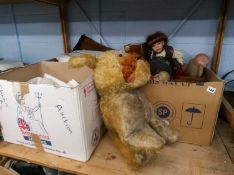 A shelf of dolls, linen and miscellaneous