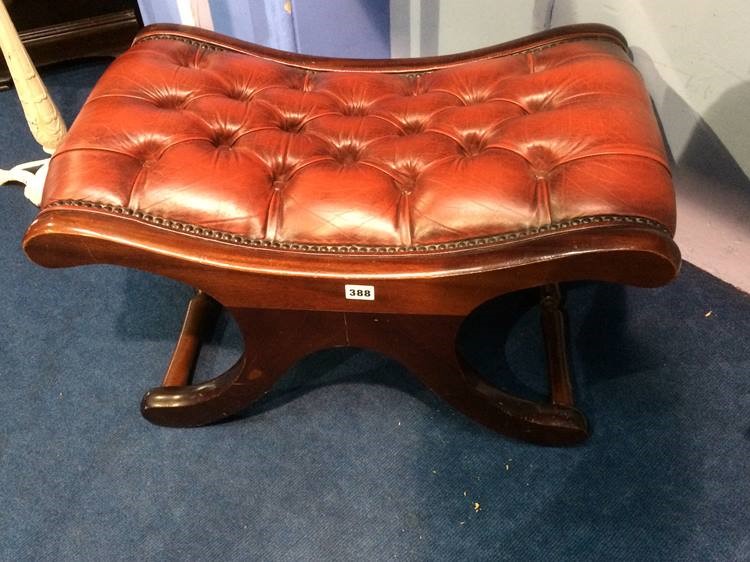 A Chesterfield leather stool
