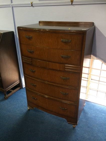 Oak bow front chest of drawers