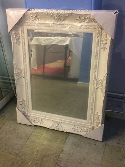 Mirror in white painted frame