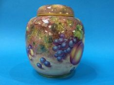 A Royal Worcester vase and cover, decorated with fruit, signed Freeman