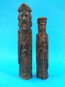 A pair of carved pine ecclesiastical figures