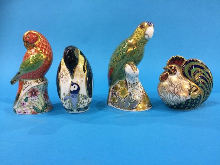 Four Royal Crown Derby paperweights, including 'Penguin', 'Farmyard Cockerel', 'Lorikeet' and '