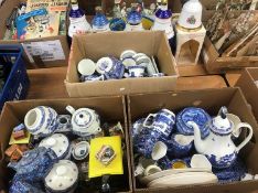 Three boxes of blue and white Ringtons china, teapots etc.