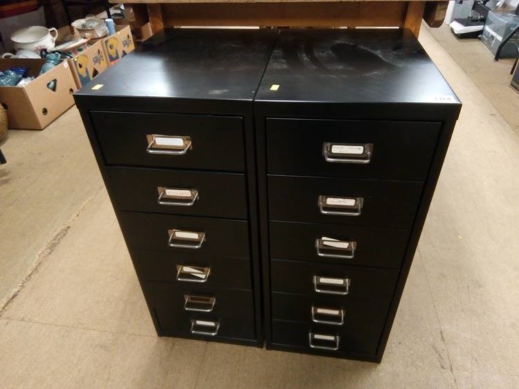 Two small black metal filing cabinets