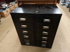 Two small black metal filing cabinets