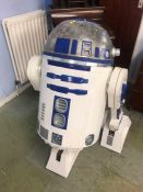A life size model of R2 D2 robot from the Star Wars franchise