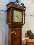 An oak long case clock, eight day movement, painted dial signed E. Lowe