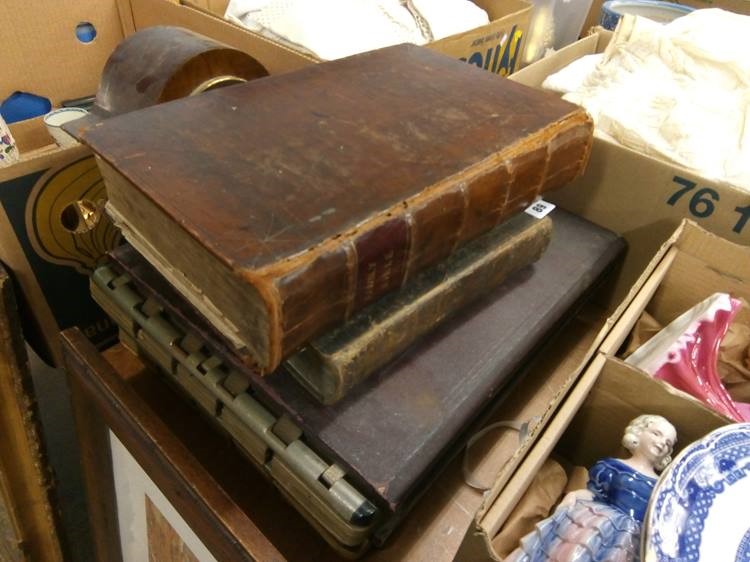 Two bibles and two large albums of match books