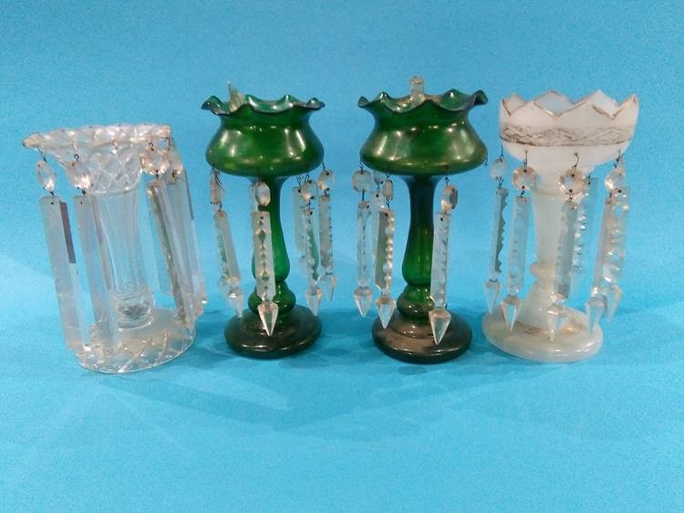 A pair of green glass lustres and two other lustres