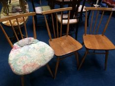 Three Ercol spindle back chairs