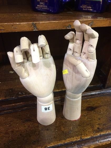 Pair of articulated wooden hands