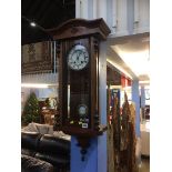 A walnut wall clock