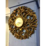 Gilt ornate wall clock