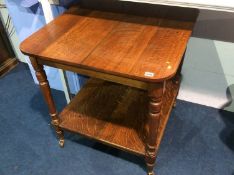 A large oak two tier table