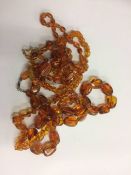 Quantity of amber coloured jewellery