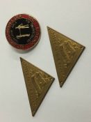 Two Durham Miners Association badges and one other