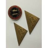 Two Durham Miners Association badges and one other