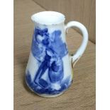 A Royal Doulton blue Children Series miniature jug