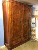 A Victorian walnut double door wardrobe