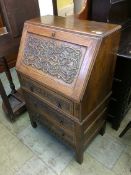 Small carved oak bureau