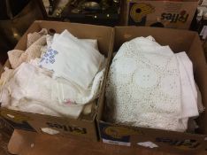 Two boxes of table cloths