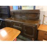 A carved oak sideboard