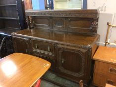 A carved oak sideboard