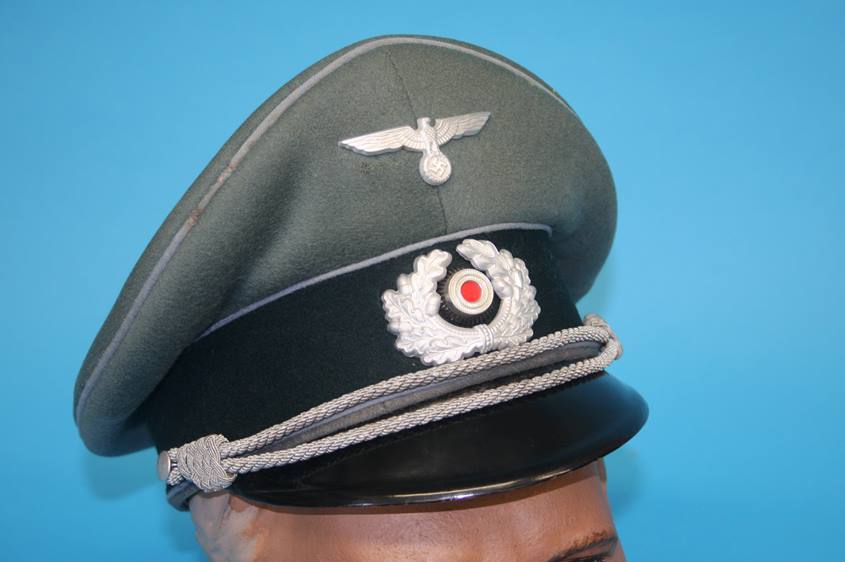 A German Transportation Officer's visor cap, stamped Sonder Ausfuhrung